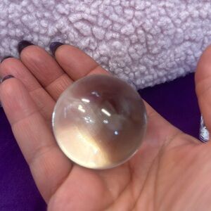 Small crystal ball on stand